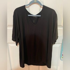 Black v-neck top from Pretty Little Thing